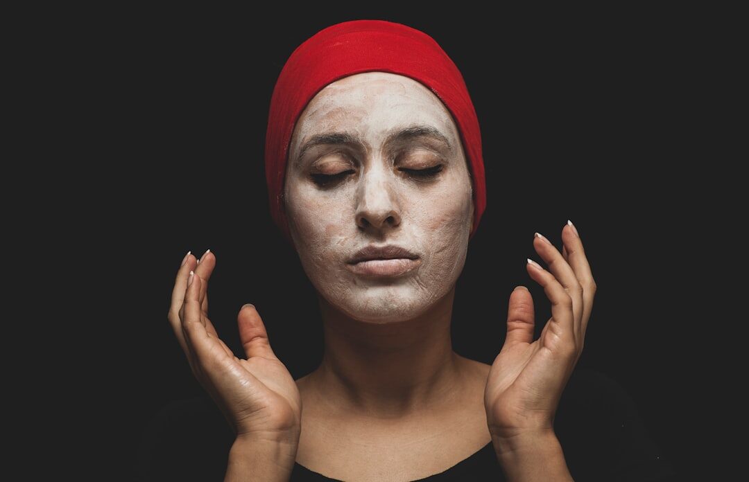 celebrity applying face mask