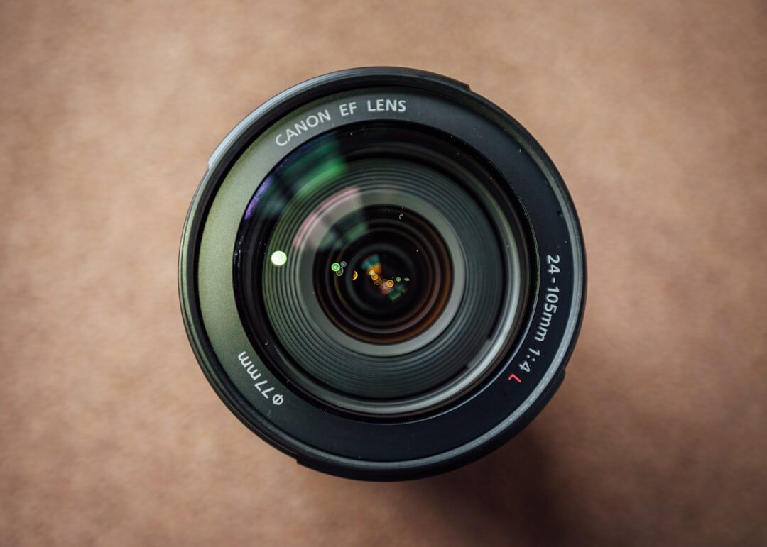 Close-up of a professional camera lens used for event photography