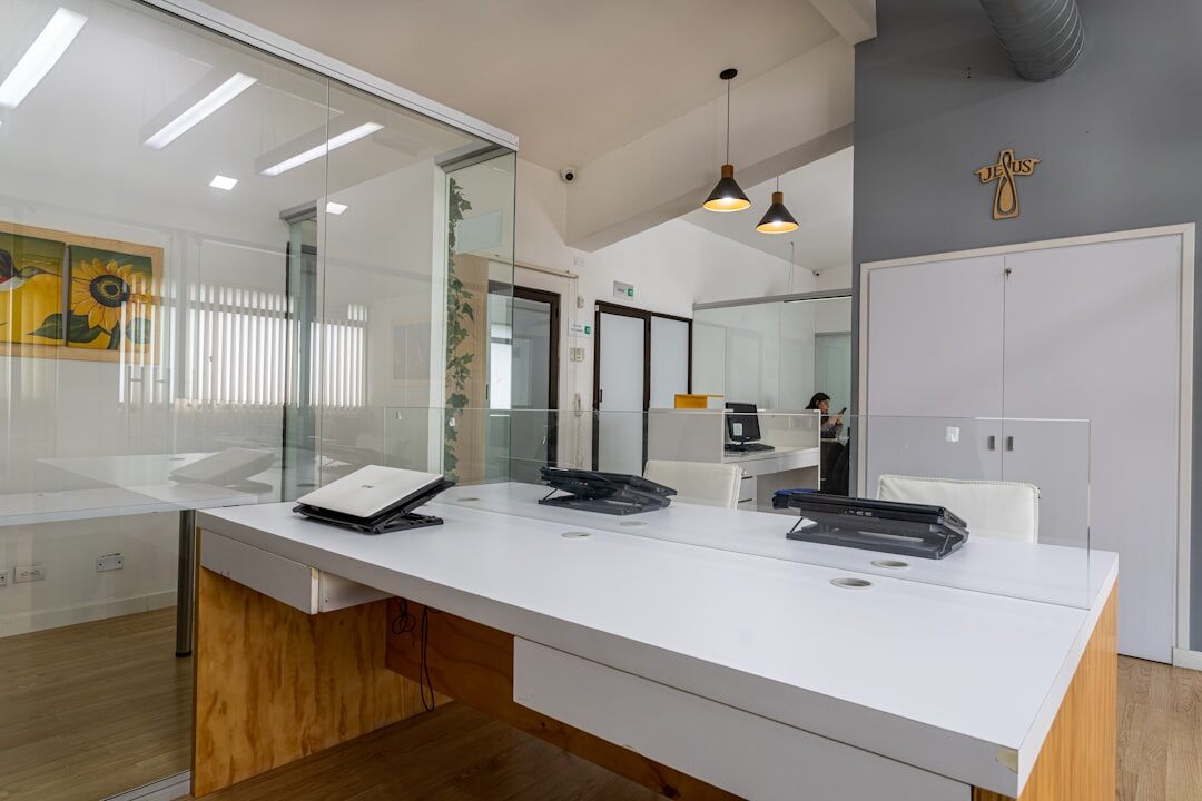 Modern reception desk with a telephone and open notebook